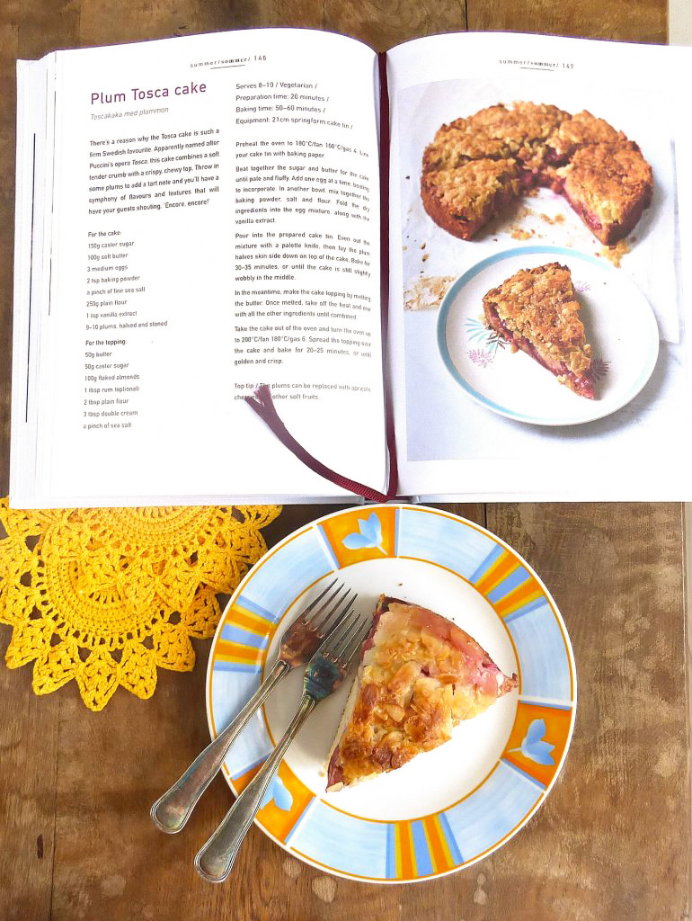 picture of a slice of cake with an open recipe book