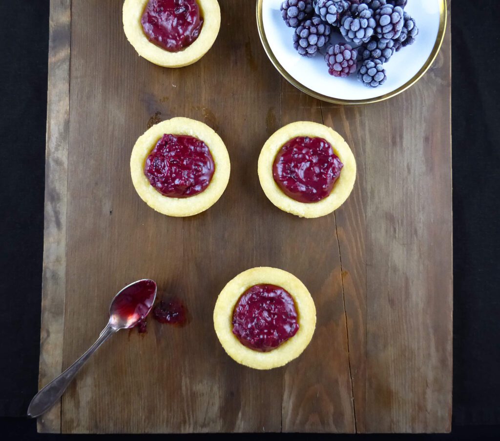 picture of blackberry cookies on a wooden board
