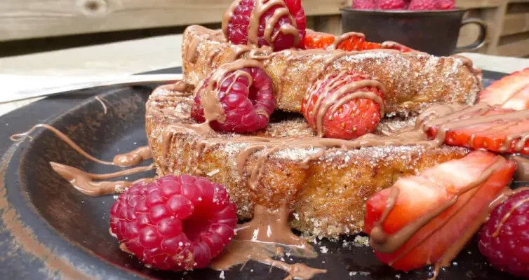 Churro French Toast (with milk chocolate, strawberries & raspberries)