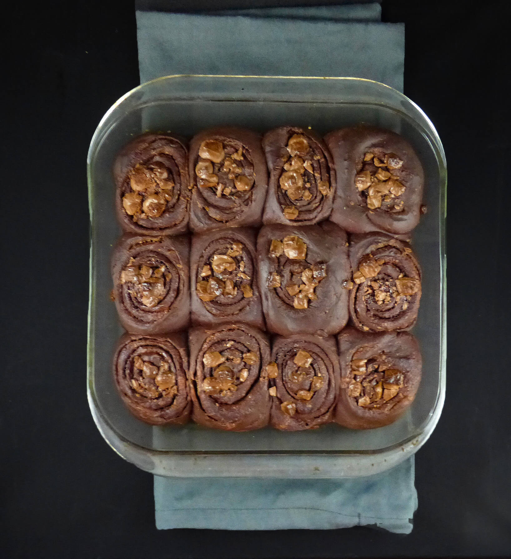 picture of chocolate cinnamon buns on a grey cloth