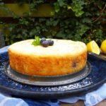 picture of white lemon kladdkaka on a blue plate