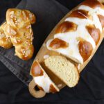 picture of a large loaf and two small plaits of cardamom bread