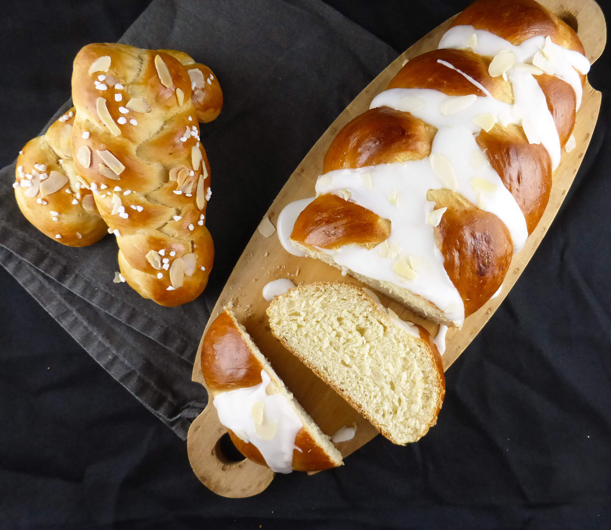 picture of a large loaf and two small plaits of cardamom bread