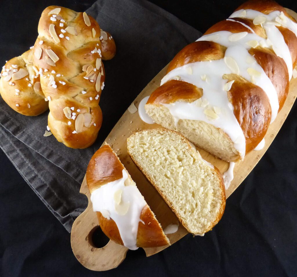 picture of a large loaf and two small plaits of cardamom bread