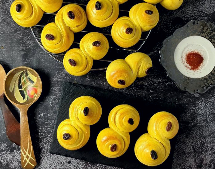 Swedish yellow saffron buns on a slate surface