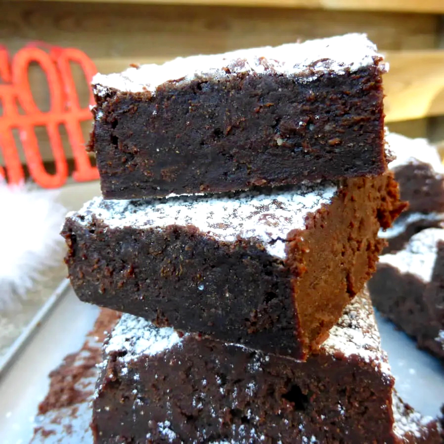Side view of festive, fudgy brownies made with gingerbread spices