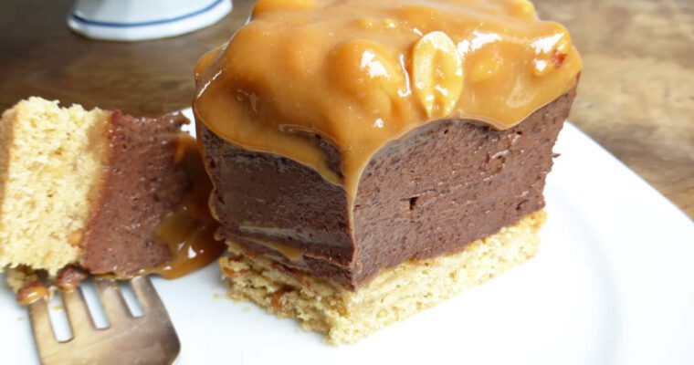 Chocolate Cheesecake with a Peanut Butter Cake Crust (and Salted Peanut Dulce de Leche Topping)