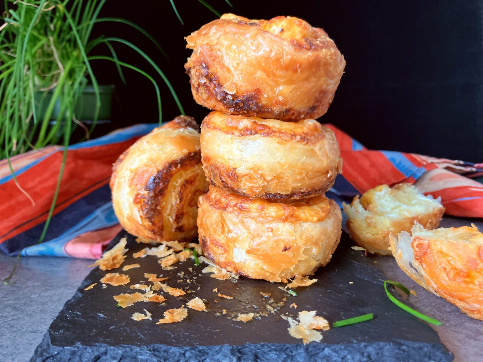 A display of savoury Cheese and Chive Puff Pastry Swirls.