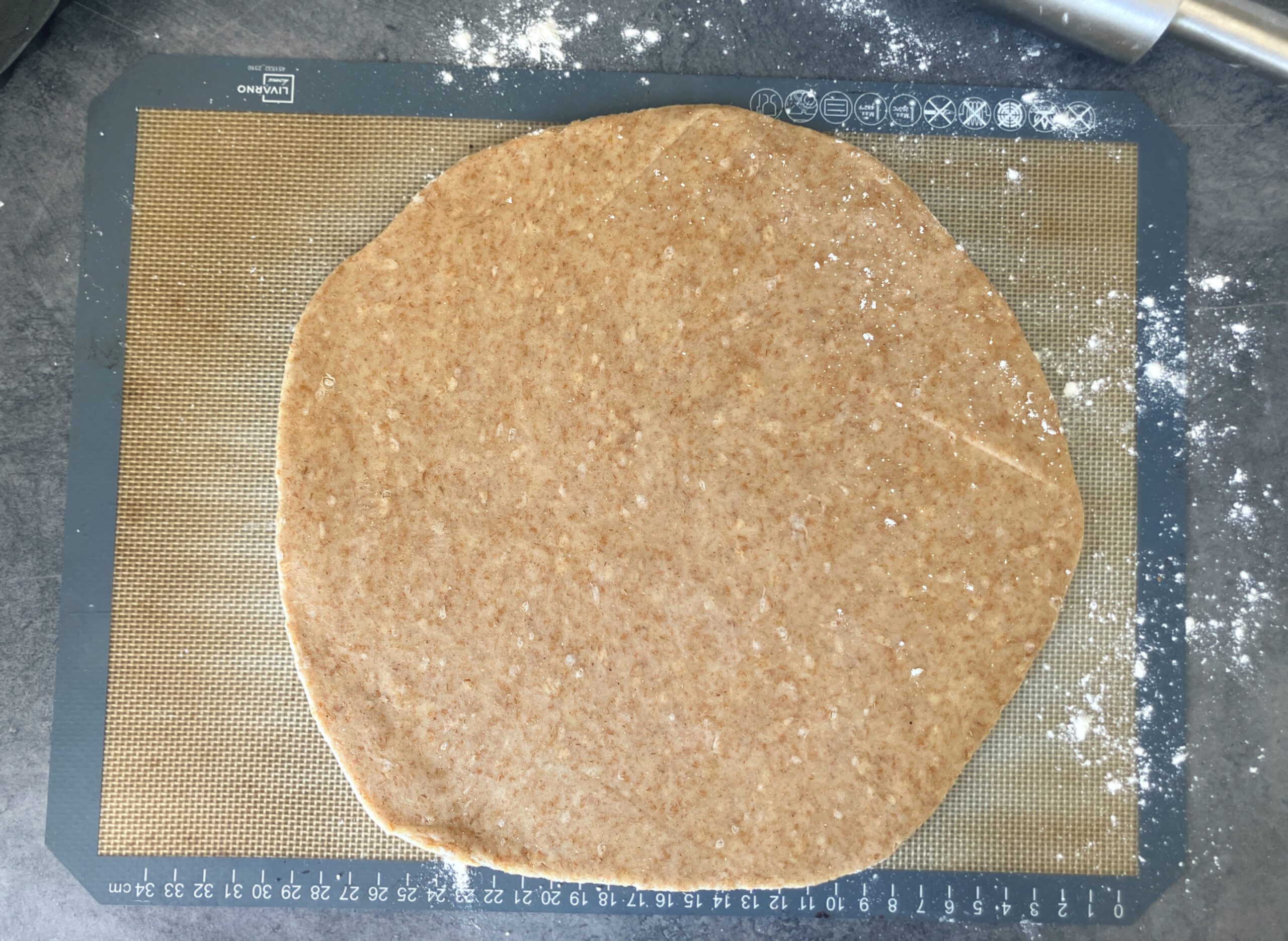 Overhead view of rolled out wholegrain spelt and olive oil pastry